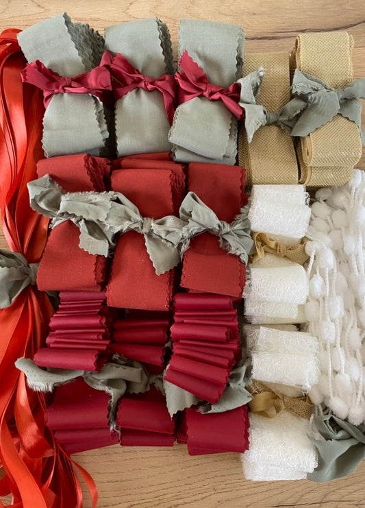 DIY ribbon backdrop kit displayed as neat bundles of fabric ribbons in matching colours.